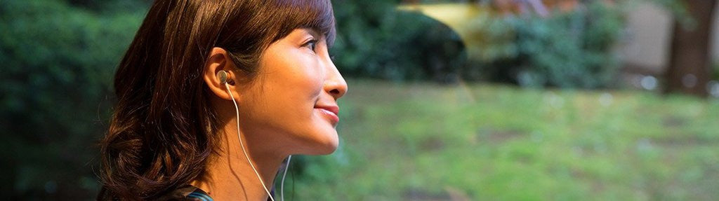 Japanese jazz singer Karen Aoki wearing Meze Headphones