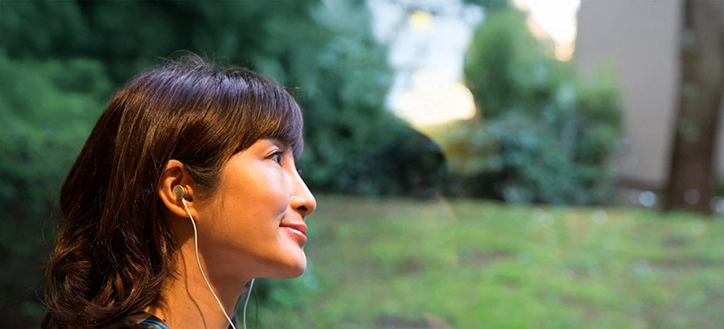Japanese jazz singer Karen Aoki wearing Meze Headphones