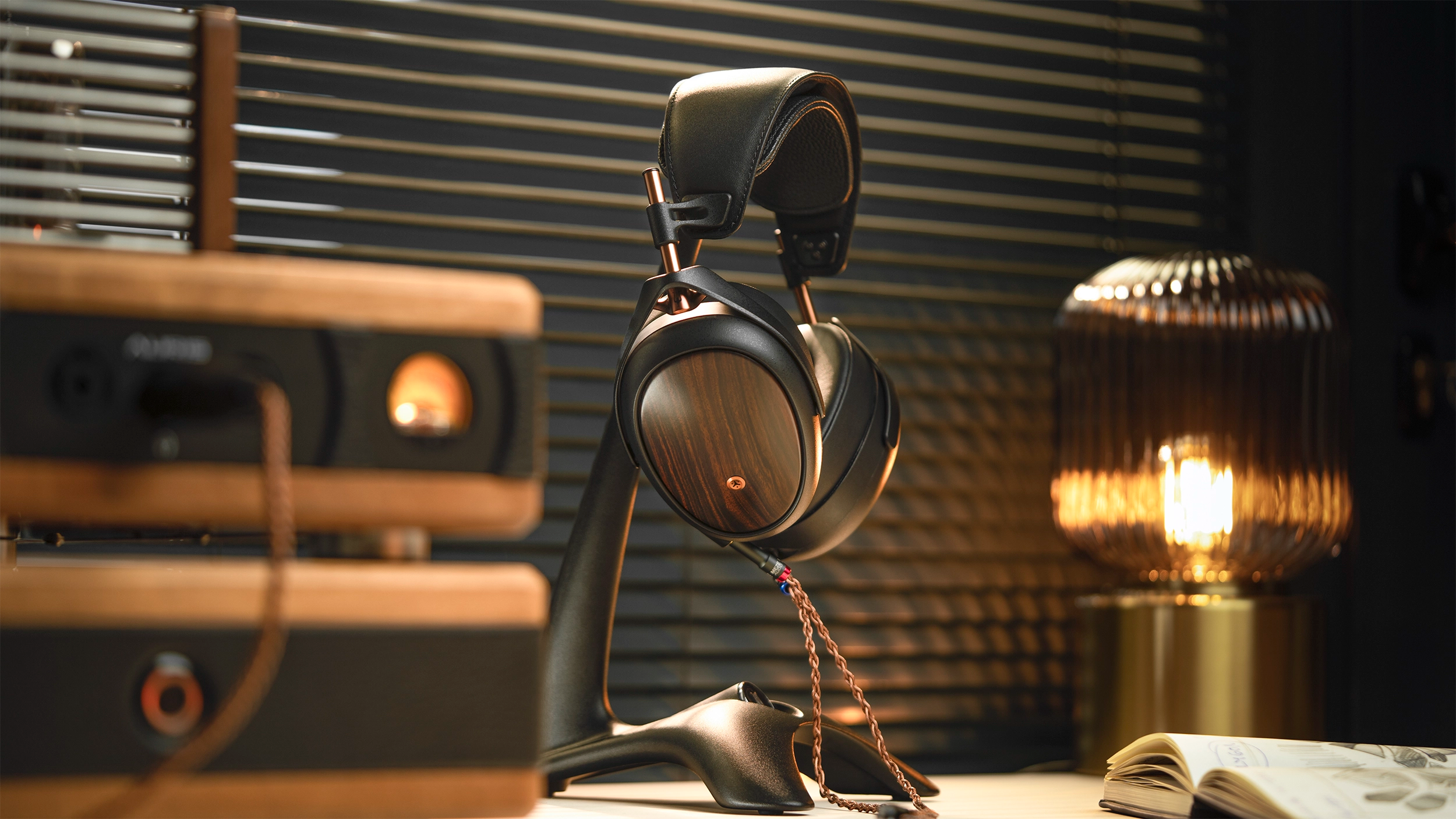 Meze Audio Liric Second Generation, best closed-back headphones on a headphone stand on a desk